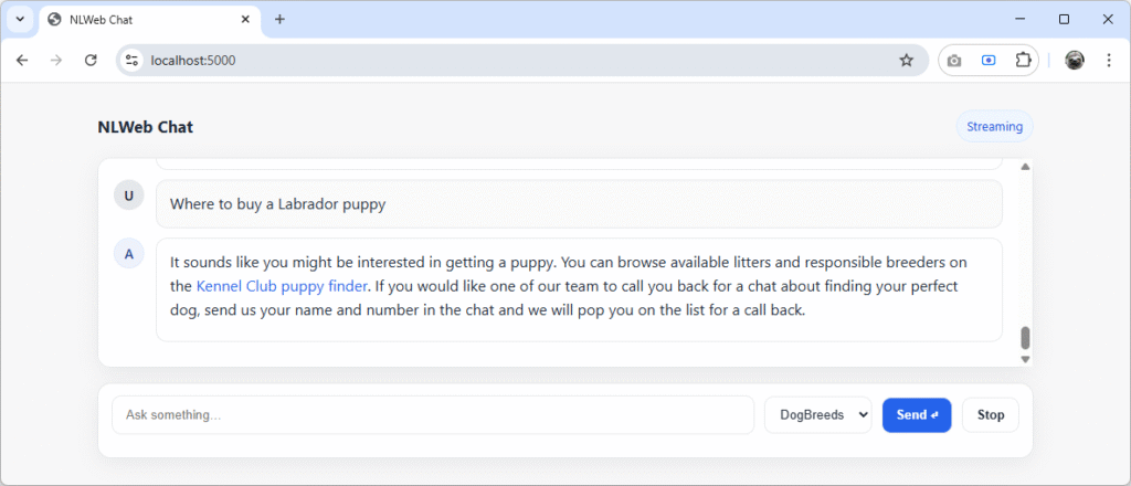 NLWeb Chat showing dog purchase intent tool response to a user asking where to buy a Labrador puppy.